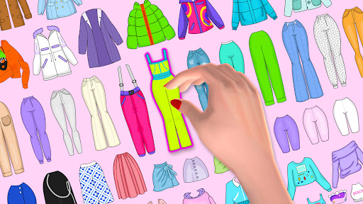 A joyful designer crafting a colorful, stylish paper doll, brimming with creativity and fashion.