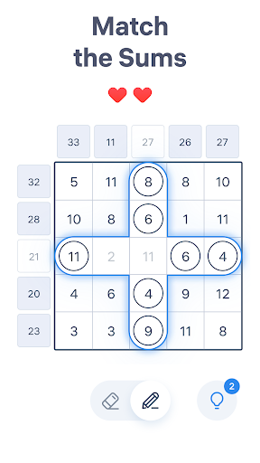 A person deeply focused on solving a number puzzle, highlighting concentration and engagement.