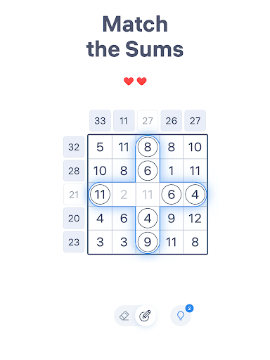 A person deeply focused on solving a number puzzle, highlighting concentration and engagement.