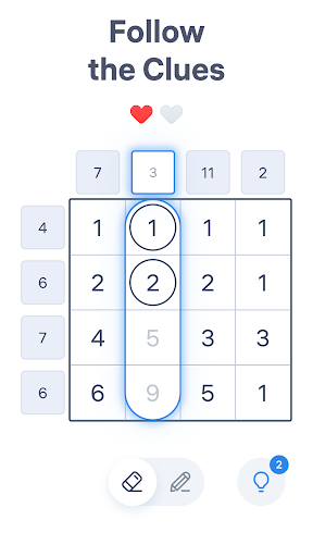 A person deeply focused on solving a number puzzle, highlighting concentration and engagement.