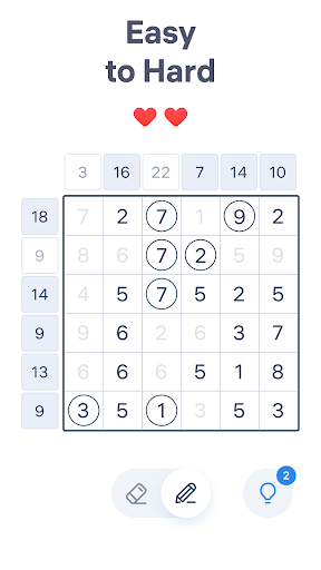 A person deeply focused on solving a number puzzle, highlighting concentration and engagement.