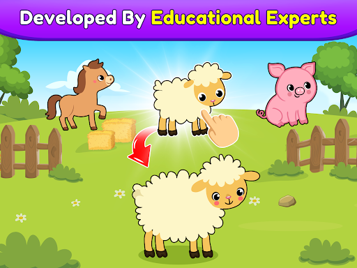 A joyful toddler engaged in an educational game, learning with colorful graphics and cheerful sounds.