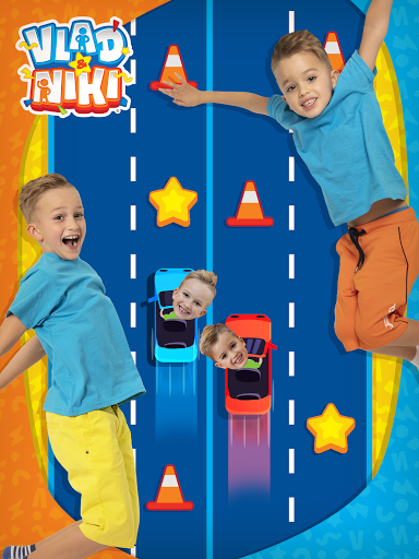 A joyful child engaging with educational games on a tablet, representing the fun and interactive learning experience provided by the Vlad & Niki App.