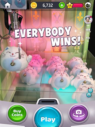 A captivating moment of excitement and anticipation as a claw machine grasps a plush toy, symbolizing the joy of winning real prizes through the Clawee app.