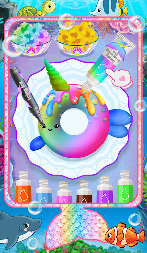 A child joyfully interacting with a colorful and engaging mermaid-themed mobile app, representing wonder and creativity.