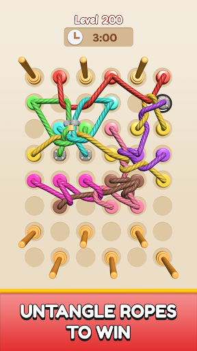 A player intensely focused on solving a complex 3D rope knot puzzle, symbolizing mental challenge and strategic thinking.