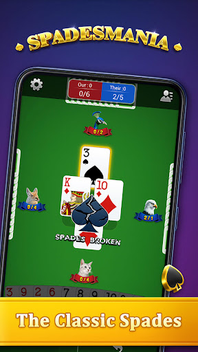 A group of friends enthusiastically playing a card game, symbolizing the excitement and camaraderie of Spades Solitaire Online.