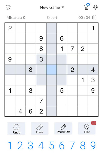 A person deeply focused on solving a captivating Sudoku puzzle, symbolizing the challenge and satisfaction of the game.