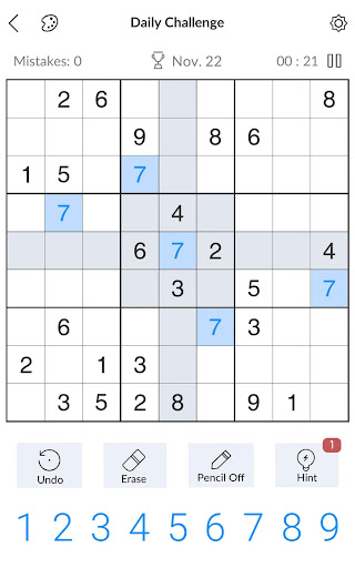 A person deeply focused on solving a captivating Sudoku puzzle, symbolizing the challenge and satisfaction of the game.