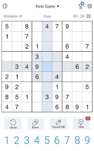 A person deeply focused on solving a captivating Sudoku puzzle, symbolizing the challenge and satisfaction of the game.