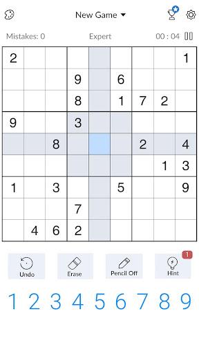 A person deeply focused on solving a captivating Sudoku puzzle, symbolizing the challenge and satisfaction of the game.