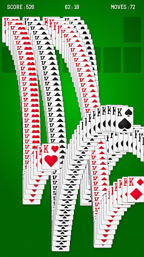 A person enthusiastically playing a game of solitaire, feeling a sense of nostalgia and excitement as they engage with a classic Klondike card game on their smartphone.