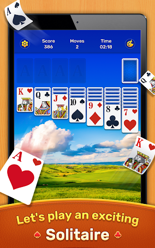 A relaxing scene of a player enjoying Solitaire Klondike on their mobile device, evoking feelings of nostalgia and strategic engagement.