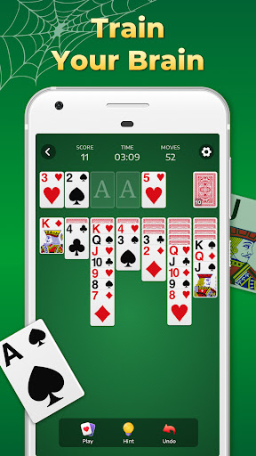 A cozy evening spent playing Spider Solitaire on a smartphone, embodying relaxation and strategic thinking.